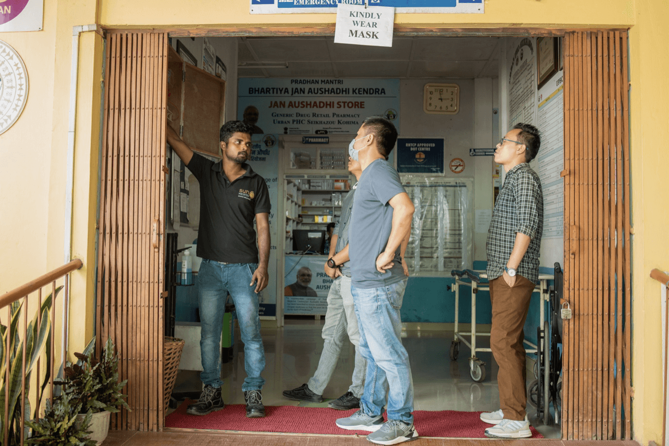 Sunmeister engineers training locals on the operation and basic maintenance of the Sunmeister's MULE,  an off-grid/hybrid solar installation